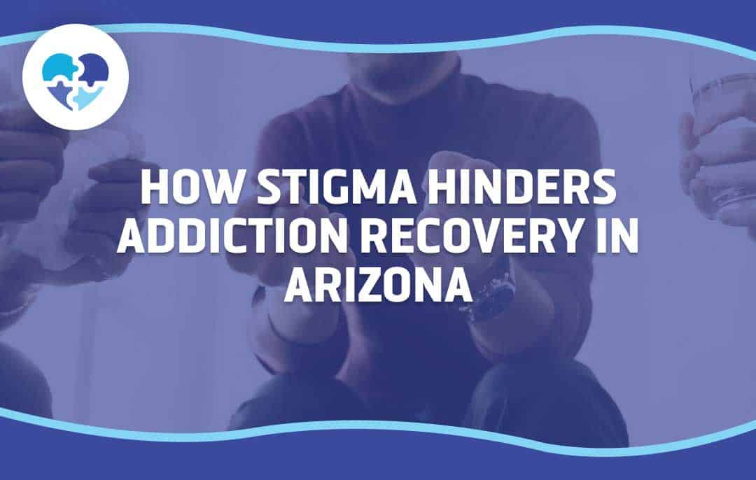 A man seated in a group session, holding a drink, with text reading “How Stigma Hinders Addiction Recovery in Arizona,” emphasizing stigma’s impact on recovery.