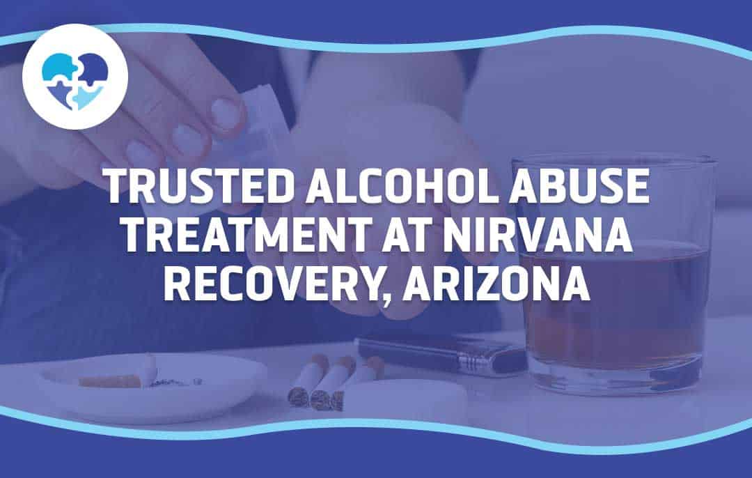 Hands near pills and a glass of liquor, symbolizing alcohol abuse treatment at Nirvana Recovery, Arizona.