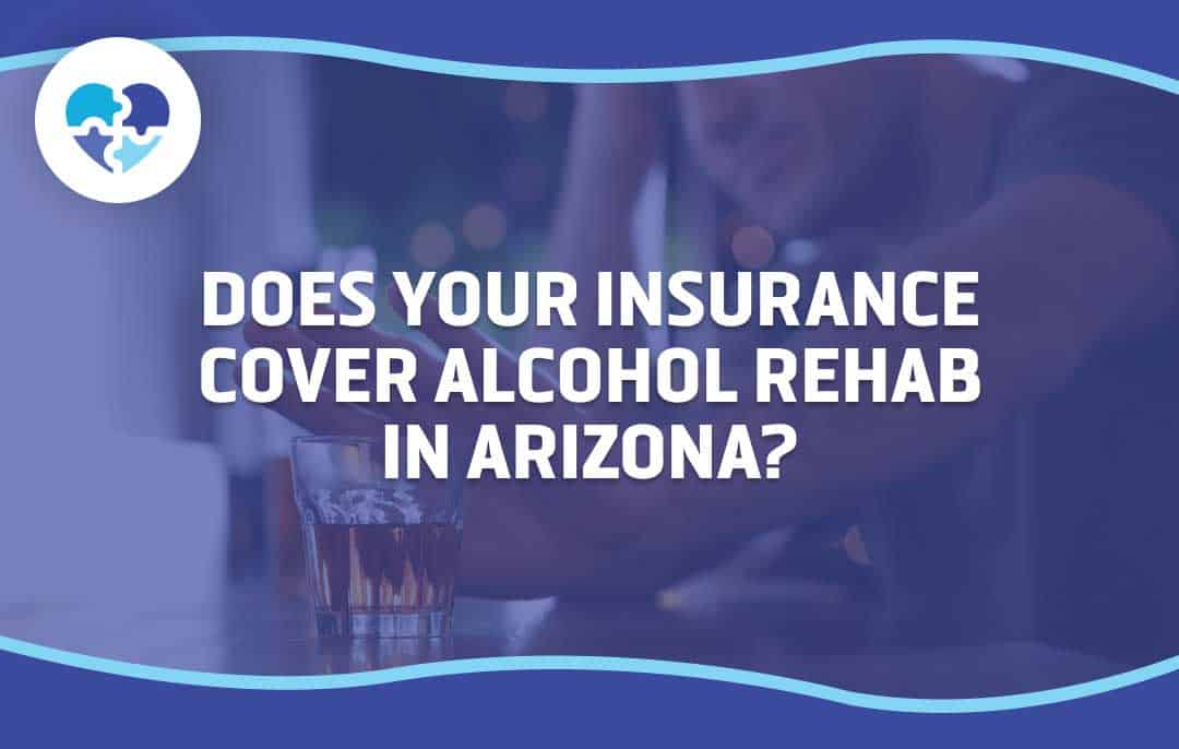 A man sits at a table with a glass of alcohol, looking distressed, highlighting the question: "Does your insurance cover alcohol rehab in Arizona?" for addiction treatment coverage.