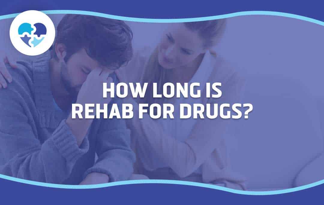 The image shows a person sitting with their head in their hands, expressing frustration, while a woman offers comforting support, symbolizing the emotional challenges faced during drug rehabilitation.