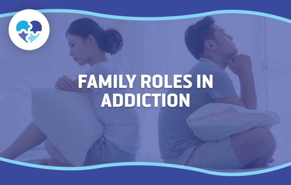 Man and woman sit back-to-back on a bed, both looking upset and distant, representing the strain of addiction on family relationships. Text reads: Family Roles in Addiction.
