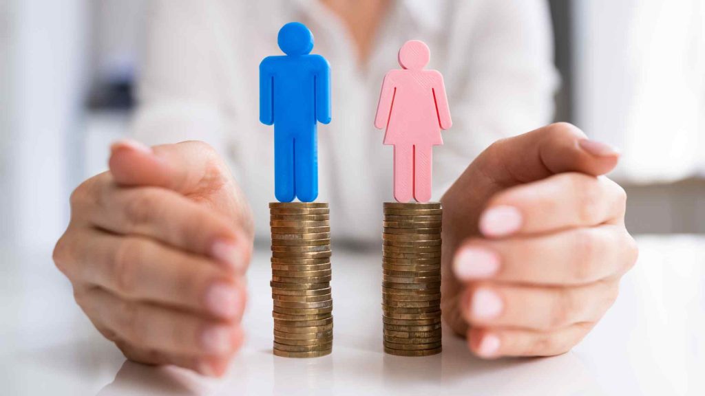 Hands surrounding icons on equal coin stacks, signaling Arizona’s Fair Wages and Healthy Families Act employment protections.